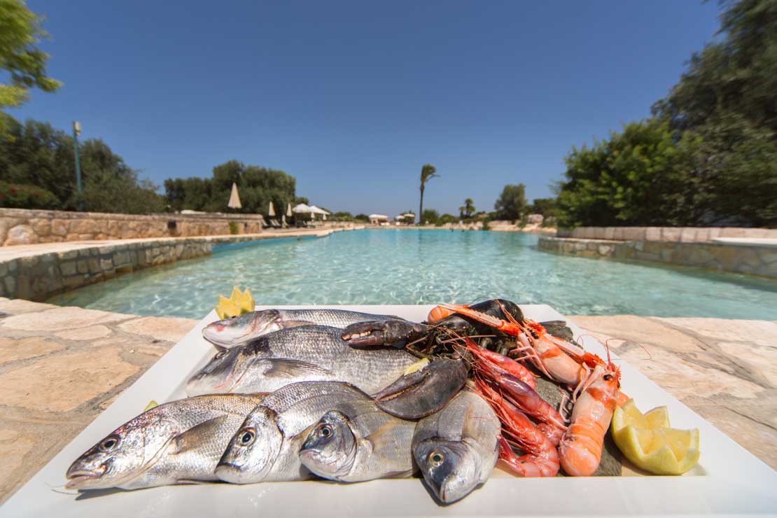 fresh fish by the pool italy